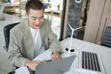 Solar panels green energy Business man working  green eco friendly office business creative idea...