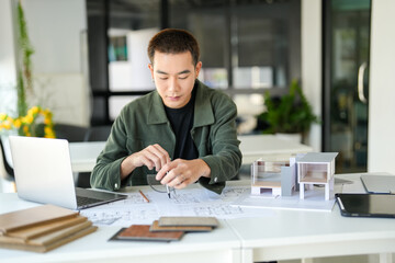 Obraz premium Architecture Man drawing on architectural Creative project business architecture building construction&nbsp;Industrial engineering Achievement Planning Design on eco blueprint