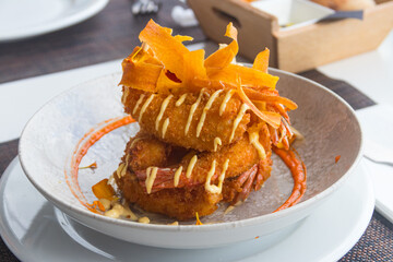 Crispy delicious fried langoustines served in a local restaurant in coastal village on Tenerife, Canary Islands, Spain