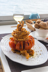 Crispy delicious fried squids served in a local restaurant in coastal village on Tenerife, Canary Islands, Spain