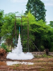 Bun Bang Fai Festival, Thailand community rocket festival, the festival features vibrant rocket processions, spectacular launches taking off to the sky, 