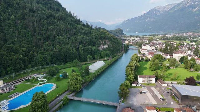 Interlaken Jungfrau region Switzerland pull back drone aerial reverse reveal