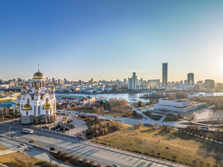 Early spring or autumn Yekaterinburg and Temple on Blood in clear sunset. Aerial view of Yekaterinburg, Russia. Translation of the text on the temple: Honest to the Lord is the death of His saints.