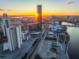 Yekaterinburg aerial panoramic view in spring at sunset. Yekaterinburg city and pond in spring or autumn.