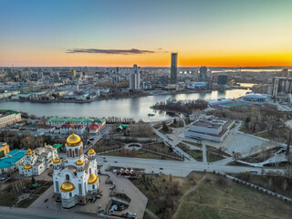 Early spring or autumn Yekaterinburg and Temple on Blood in clear sunset. Aerial view of Yekaterinburg, Russia. Translation of the text on the temple: Honest to the Lord is the death of His saints.