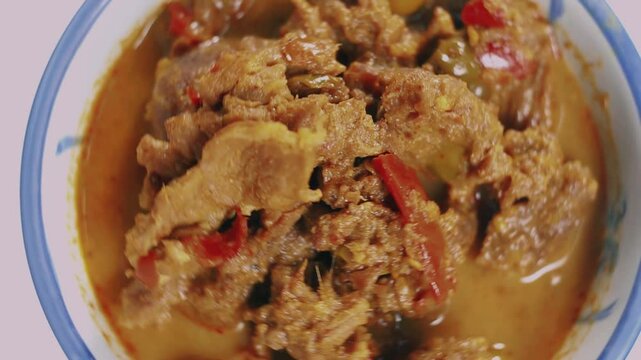 Close up top view and rotating scenes of Beef curry. Thai traditional food.