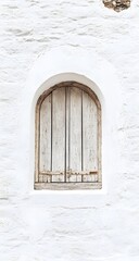 Fototapeta premium Minimalist wall design with white stone texture and an arched wood-framed window, creating a peaceful and balanced layout.