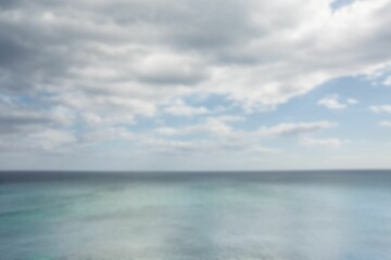 Fototapeta premium Scenic view of sea against cloudy sky