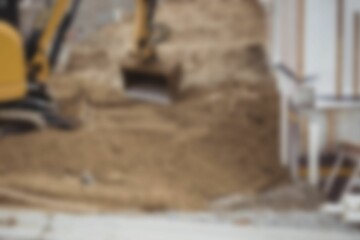 Bulldozer removing mud at construction site