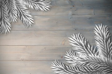 Fir branches over wooden planks