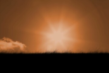 Dark sky with lens flare over silhouette landscape