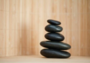 Stones against wooden wall