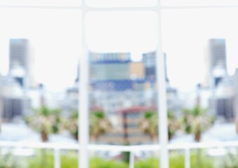 Flat design is showing bright overexposed urban skyline through white window frame with palm trees