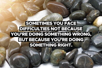 Inspirational life quote on blurry background. Sometimes you face difficulties not because you're...