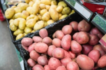 Potatoes and sweet potatoes in crate