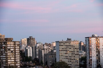 Buildings against sky during sunset