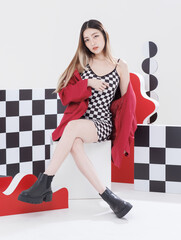 Fashionable photo confident woman model asian beautiful female wearing trendy checkered mini dress...