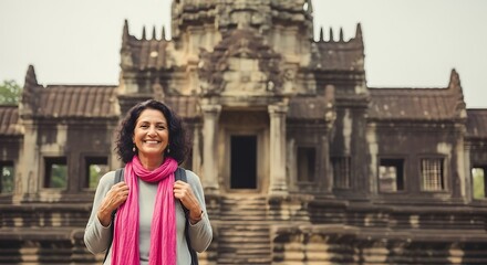Smiling Woman Traveler at Ancient Temple in Asia