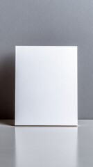 Blank White Card Mockup on Grey Wall