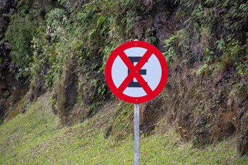 The No Stopping or Parking sign alerts drivers with a clear red symbol: free area for circulation,...