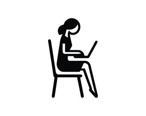 Woman working on laptop  sitting in chair