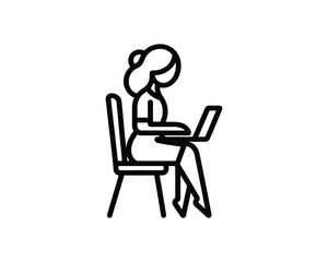 Woman working on laptop  sitting in chair