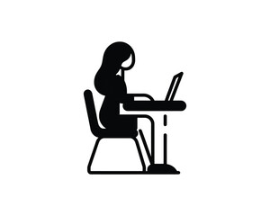 Woman working on laptop at desk