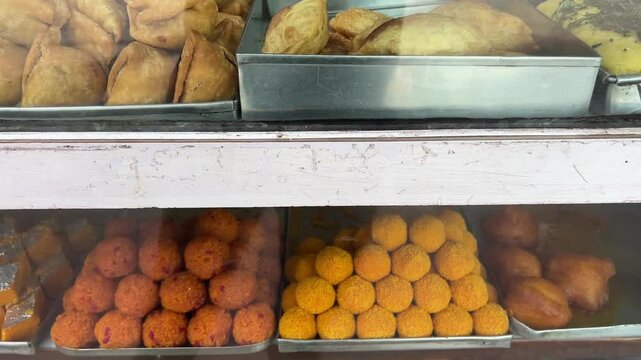 Jalebi, Sandesh, kachori, singara, malpua at a sweet meat shop in Kolkata, India
