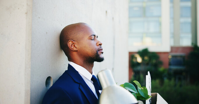 Bankruptcy, fired and unemployment with business black man in city for reaction to job loss. Depression, mistake and regret with unhappy employee outdoor in urban town for economic recession