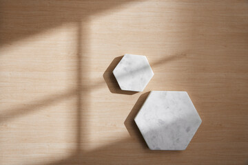 Light and Shadow on Wooden Texture with Modern Objects. Minimal Home Decor Scene with Ceramic Trays.