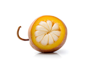 Halved Mammea Americana, revealing the vibrant yellow flesh and creamy white segments, sitting isolated on a stark white background, highlighting its unique texture and exotic appeal.