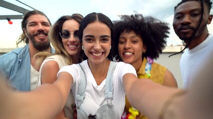 Happy friends taking a selfie on a rooftop - Powered by Adobe
