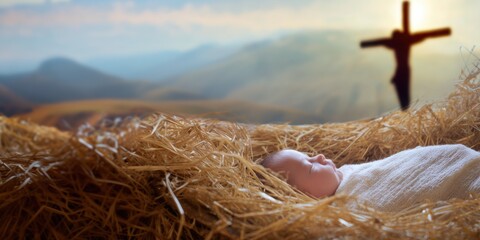 Newborn baby sleeps in hay in a manger. Religious Christian Christmas nativity scene. Concept of the birth of Jesus Christ, salvation and redemption for christianity.