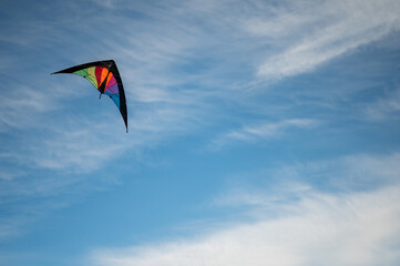 Dual line colourful kite flying in the sky, Copy space