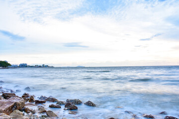 Sunset sky clouds in the Evening with Golden orange sunlight in golden hour, Dusk sky background.