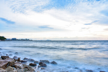 Sunset sky clouds in the Evening with Golden orange sunlight in golden hour, Dusk sky background.