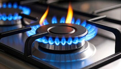 Close-up Of Burning Gas Stove With Blue And Orange Flames And Black Metal Frame