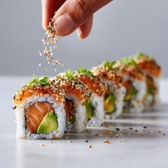 Sesame Seeds Being Added to Sushi Rolls