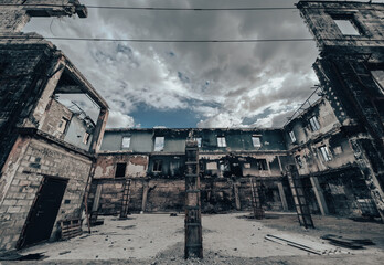 destroyed and burned houses in the city in Ukraine