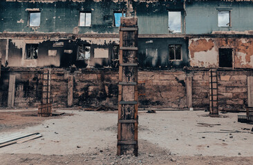 destroyed and burned houses in the city in Ukraine