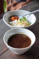 Rawon, East Java, Indonesia, captured on July 4, 2025. Traditional beef soup with rich black broth made from keluak nuts, served with rice, bean sprouts, and salted egg for a bold and aromatic flavor.