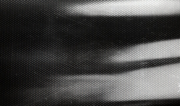 Subtle halftone texture overlay. Monochrome abstract splattered background.