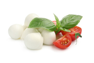 Tasty mozzarella cheese balls, tomatoes and basil isolated on white
