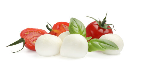 Tasty mozzarella cheese balls, tomatoes and basil isolated on white