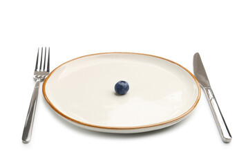 Plate with fresh blueberry and cutlery isolated on white
