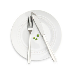 Plate with fresh green peas and cutlery isolated on white, top view