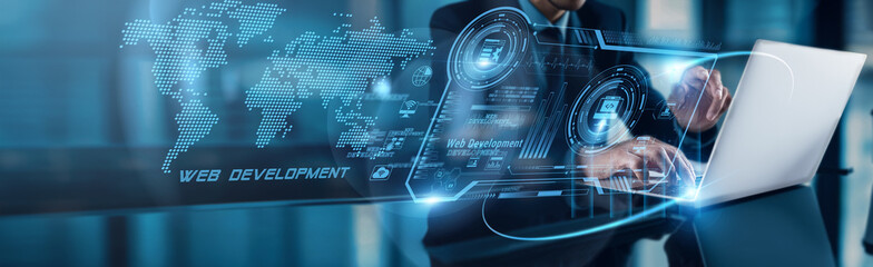 A businessman uses his laptop to analyze Web Development data, observing user engagement growth on...