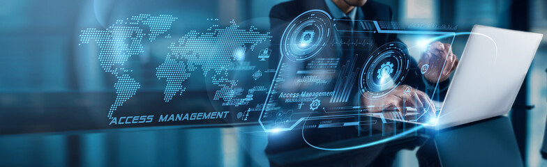 A businessman using a laptop with analysis data of Access Management system growth to enhance...