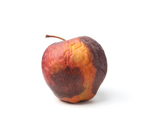 One rotten apple with wrinkles isolated on white