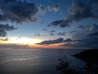 Fototapeta premium Sunset at Windmill Viewpoint in Phuket, Thailand – Scenic Coastal Landscape